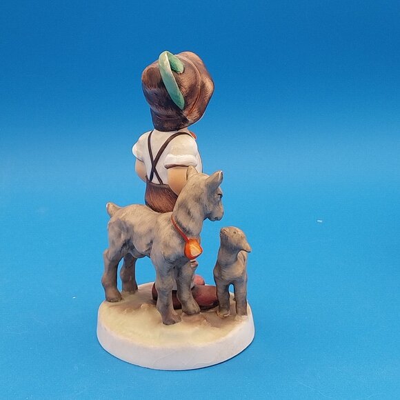 Hummel Sculpture of Child with Goats - Brown, Cream, and Red - Picture 4 of 7